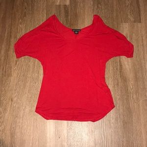 red blouse with cutout sleeves